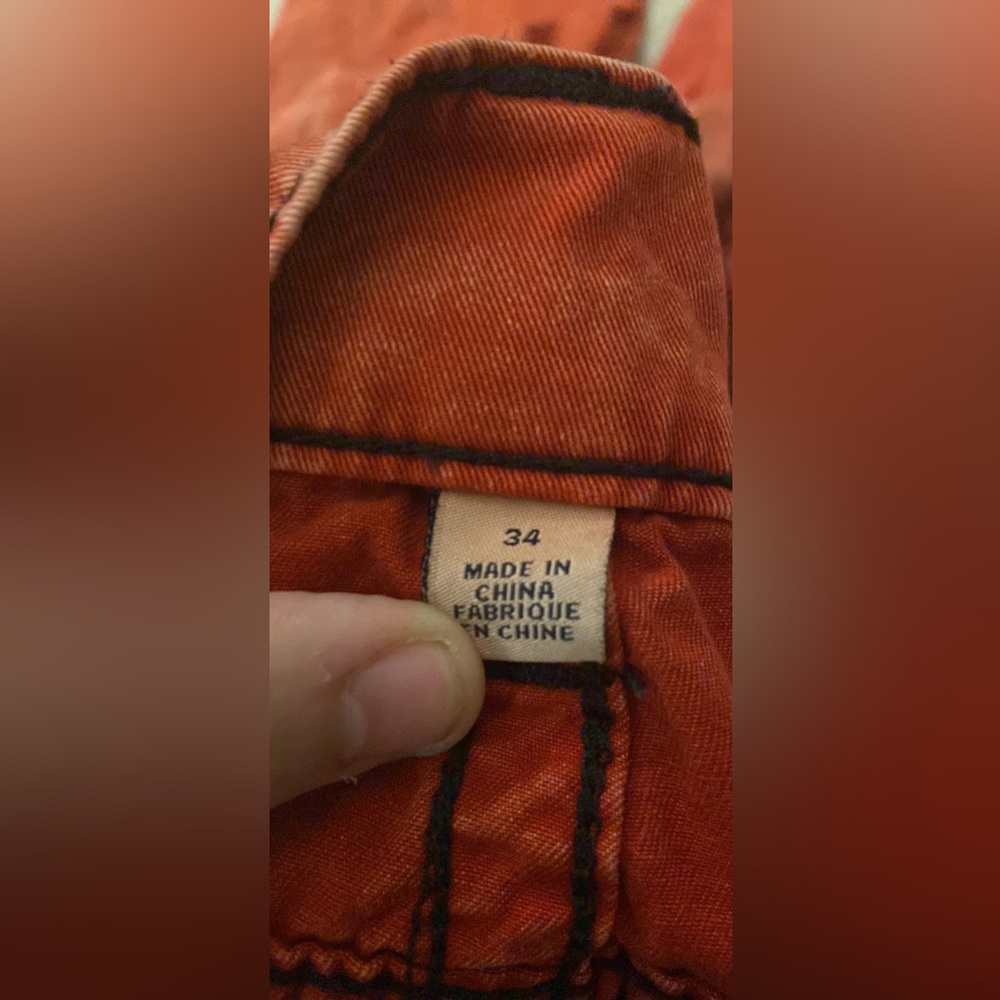 size 34 true religion jeans red with black stitching